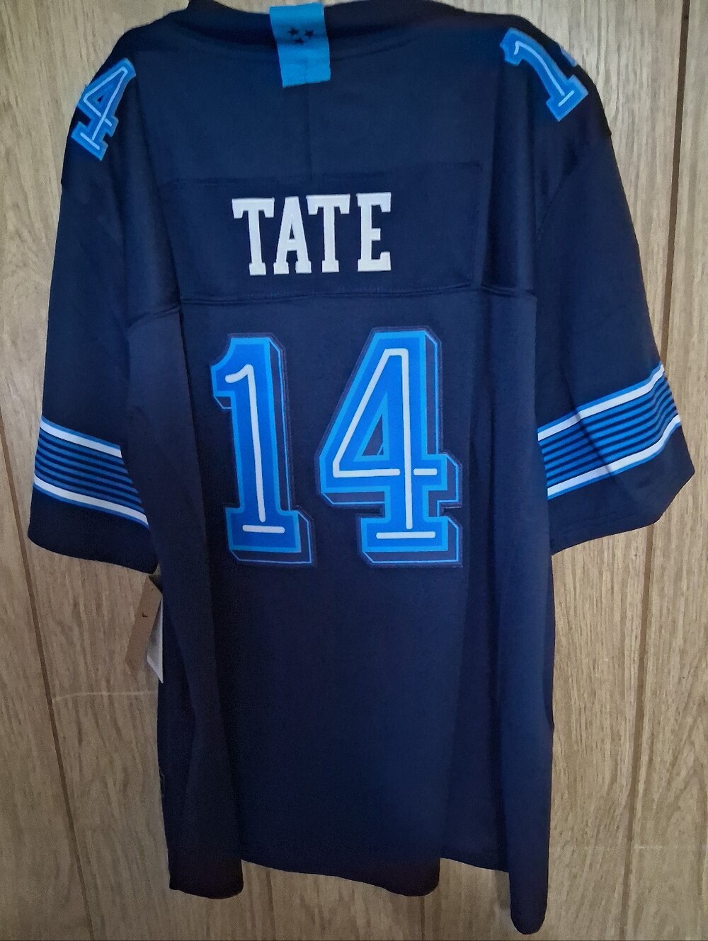 Mystery Sports Card With Carnell Tate Tennessee Titans Fuse Rivalry Large Jersey